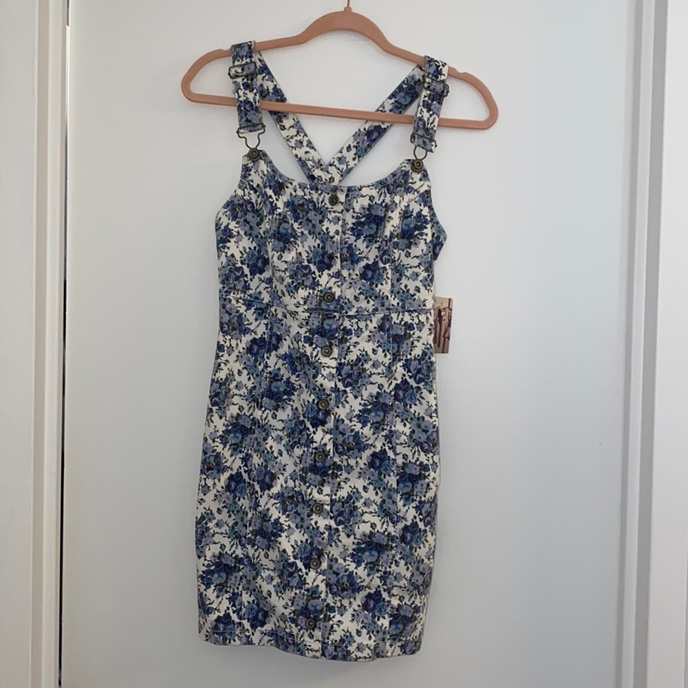 Overall mini dress from UO- Kimchi Blue with blue floral print.